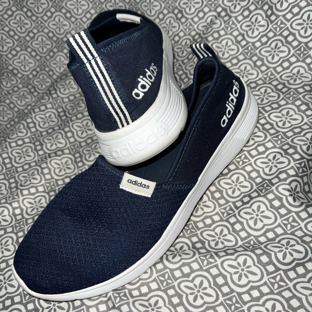 Navy blue Adidas memory foam slip on shoe